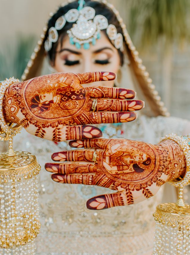 Indian bride with mehndi art